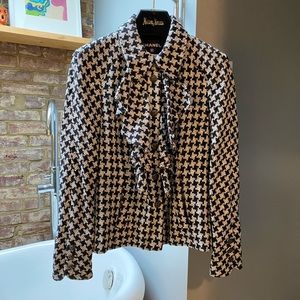Authentic Chanel houndstooth jacket made in France.